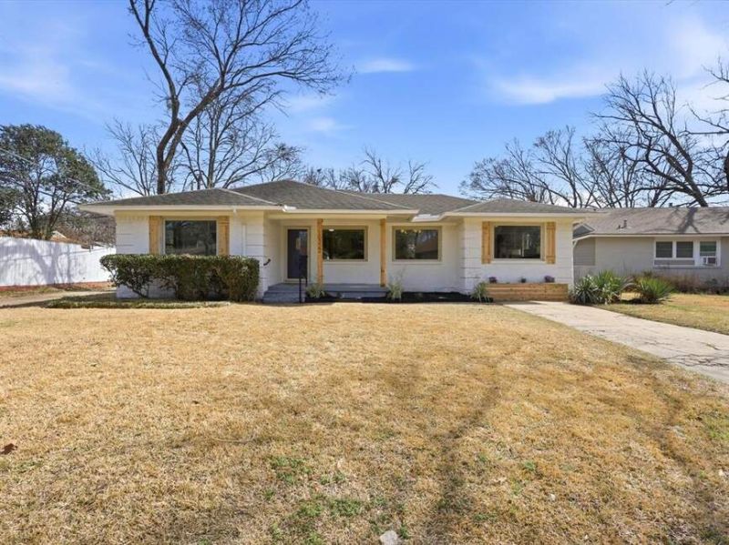 Beautifully updated 4-bedroom, 2-bath home offering 1