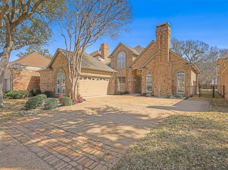 Discover this low-maintenance custom home in the peaceful,