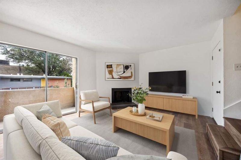 Welcome to your urban oasis! This spacious 2-level condo