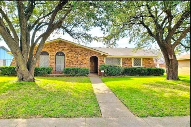 Nestled in a quiet, established neighborhood