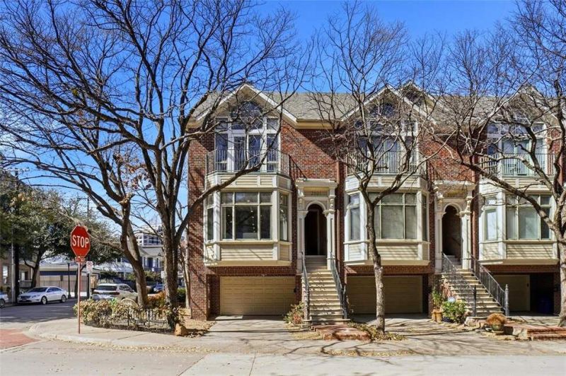 Welcome to 2601 Colby St., a rare luxury end-unit Brownstone