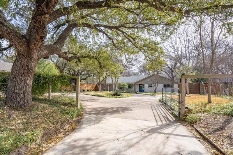 Welcome to 9576 Ash Creek, a stunning home set on a serene