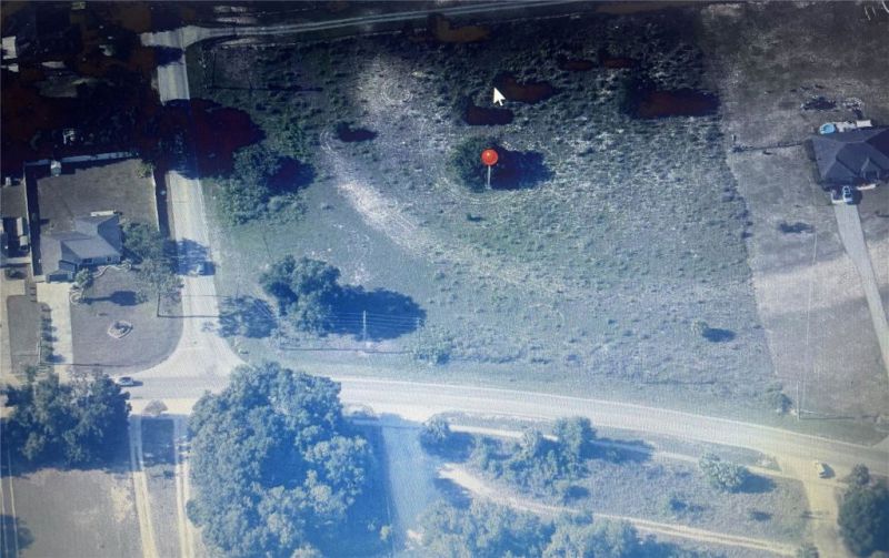 3.88 RESIDENTIAL ZONED ACRES RIGHT BY THE LAKE!
