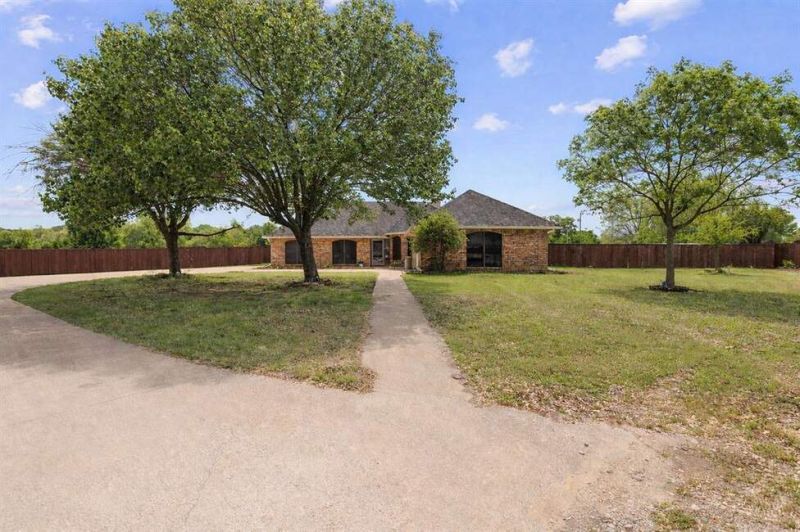 Tucked away on just over an acre, this property offers the perfect blend of space,