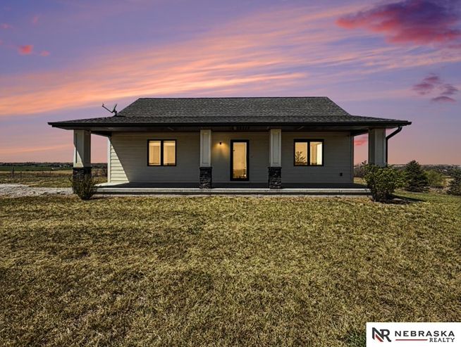 "Miles of stunning views in every direction set the tone for this beautiful home