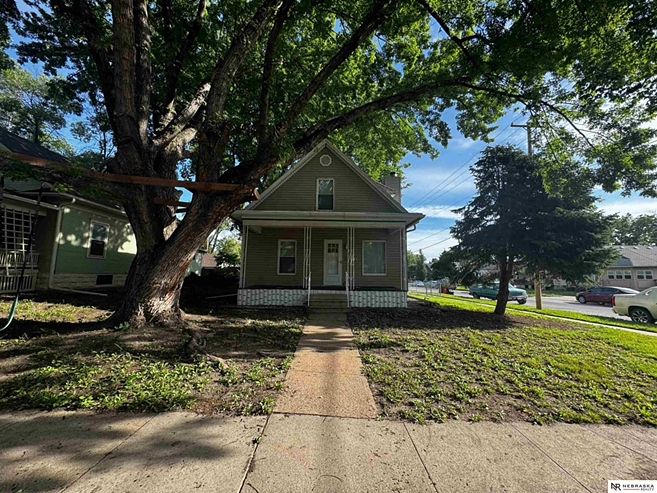 Welcome home to this beautifully updated 1.5-story charmer situated on a desirable corner lot!