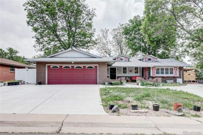 Welcome to a truly one-of-a-kind Arvada home where character