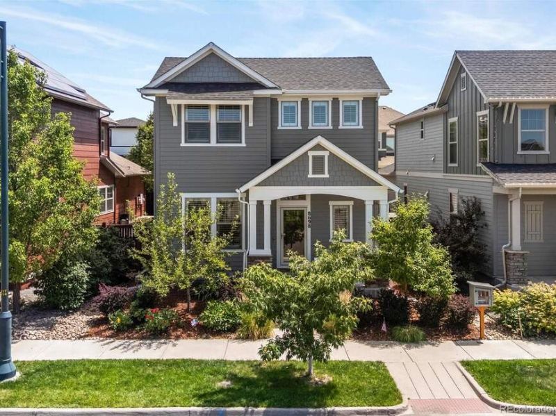 Beautifully maintained and thoughtfully designed, this 4-bed, 4-bath