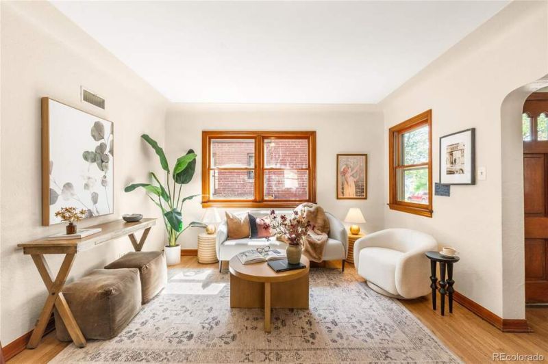 This classic brick bungalow offers rare versatility