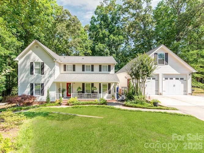 Nestled on a private, tree-lined lot with no HOA