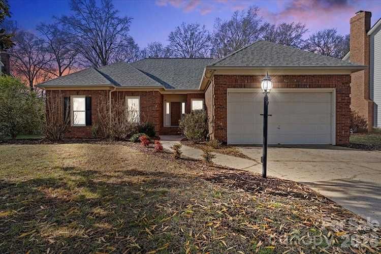 Welcome to this charming one-story home tucked away