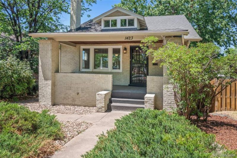 Welcome to this classic 1926 Denver bungalow, ideally positioned in the highly desirable Washington Park neighborhood.
