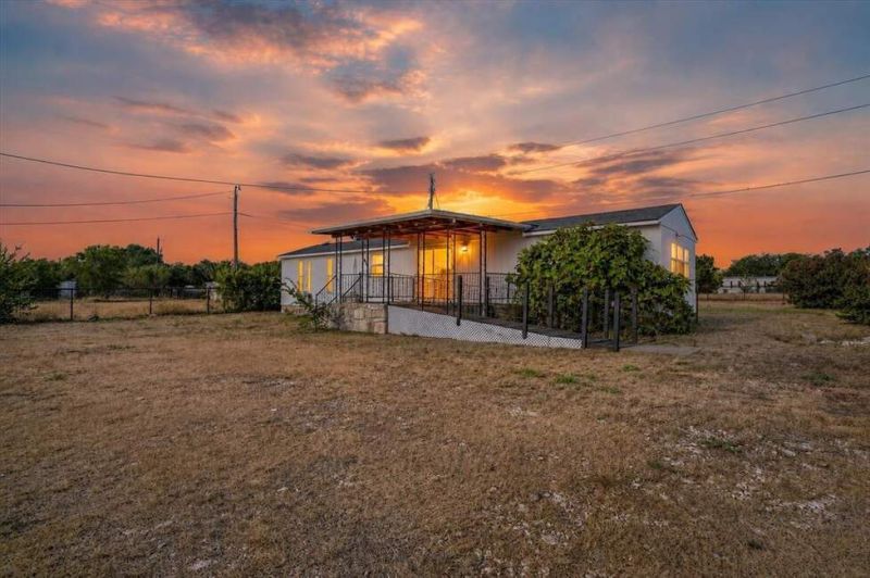 Enjoy the lake lifestyle in this charming 2-bedroom, 2-bath home