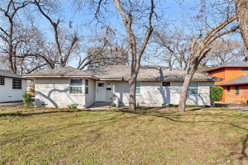 Mid-century remodeled retreat on nearly a 4th acre in Kiest Park with no HOA.